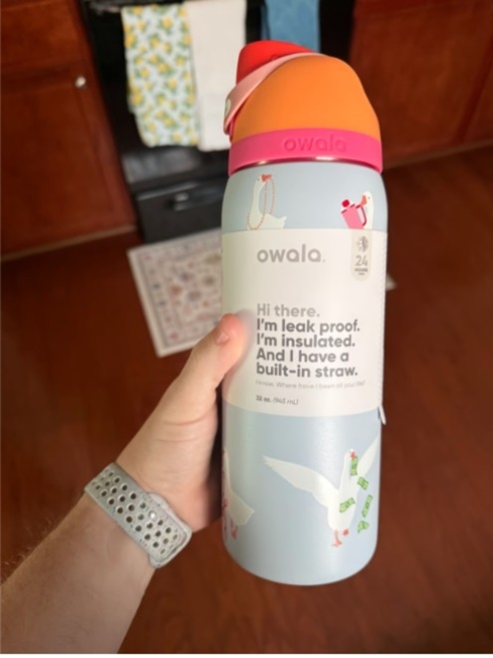 Owala Insulated Straw Bottle in Light Blue with Pink & Orange Lid
